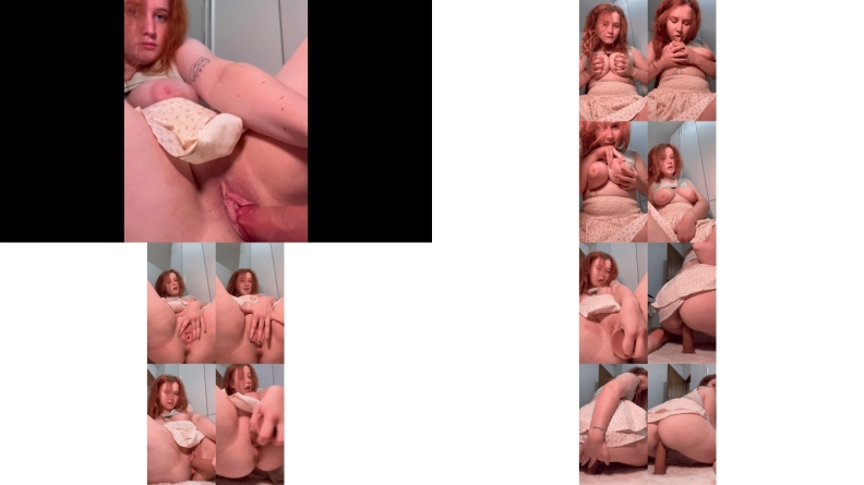 Redhead trying a huge dildo